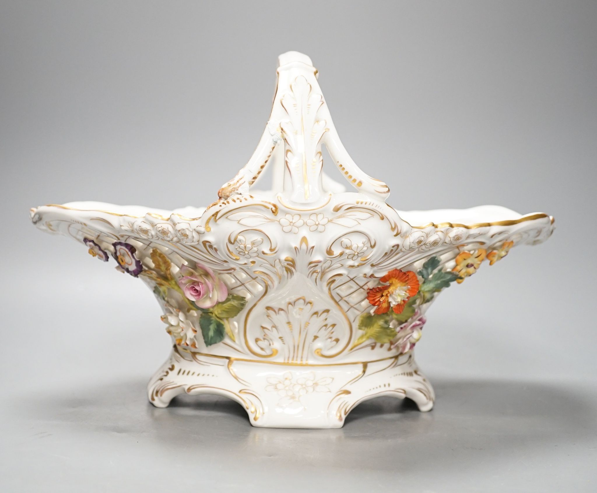 A Dresden porcelain floral encrusted basket 34cm